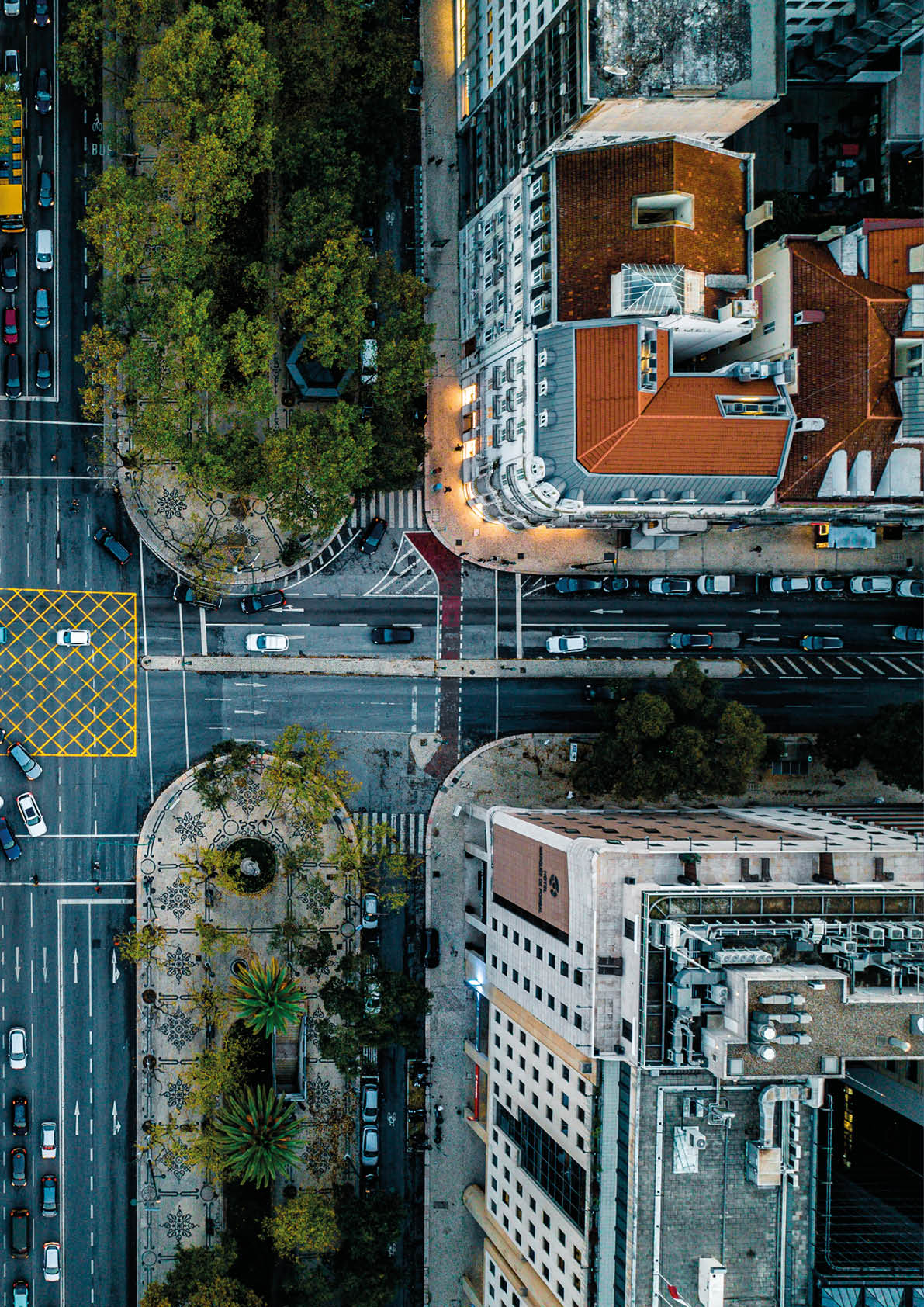 Top Down Aerial View of Cars Driving Through Intersection at Lisbon